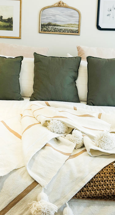 MOROCCO: Handmade Moroccan white pom-pom blanket with camel stripes