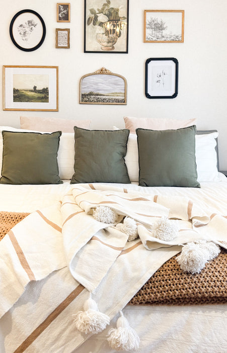 MOROCCO: Handmade Moroccan white pom-pom blanket with camel stripes