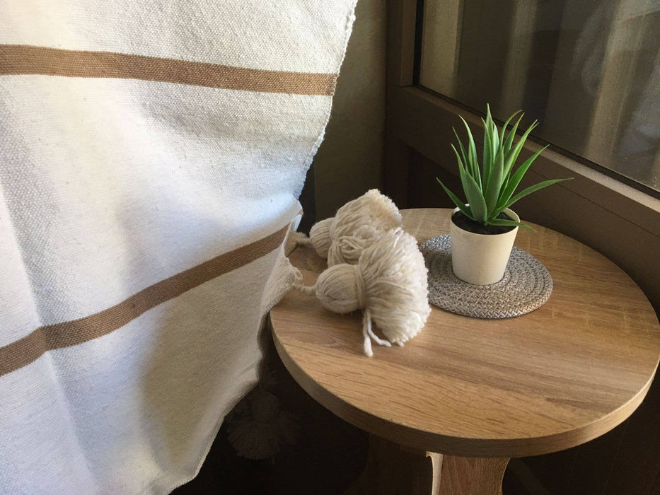MOROCCO: Handmade Moroccan white pom-pom blanket with camel stripes
