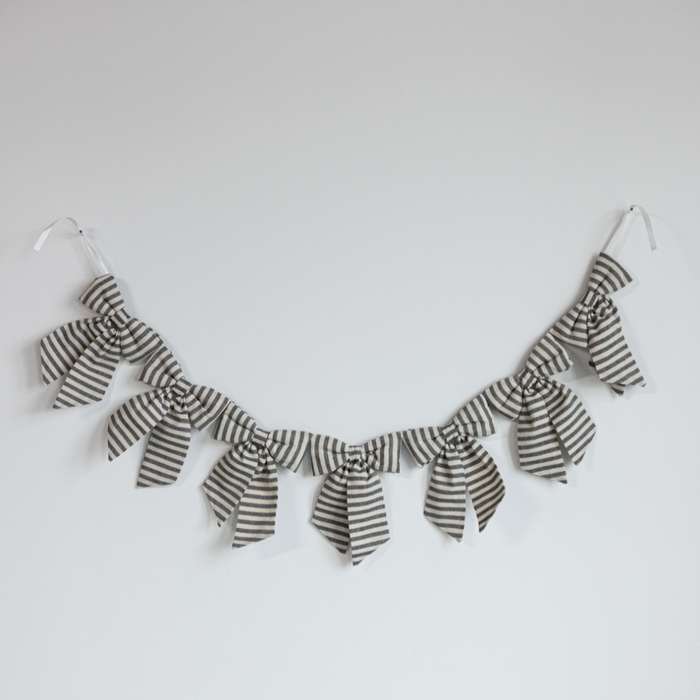 Charcoal striped knot garland with a thin gold stripe