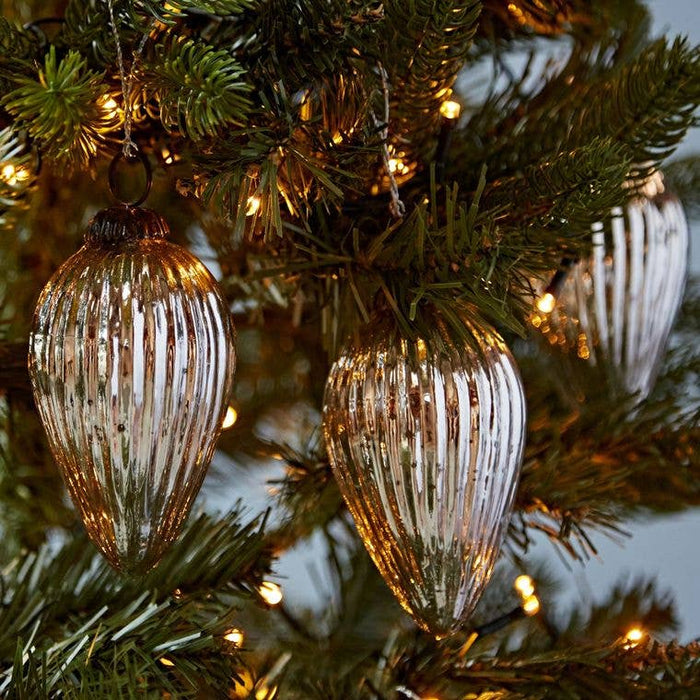 Set of three antique-effect glass Christmas baubles